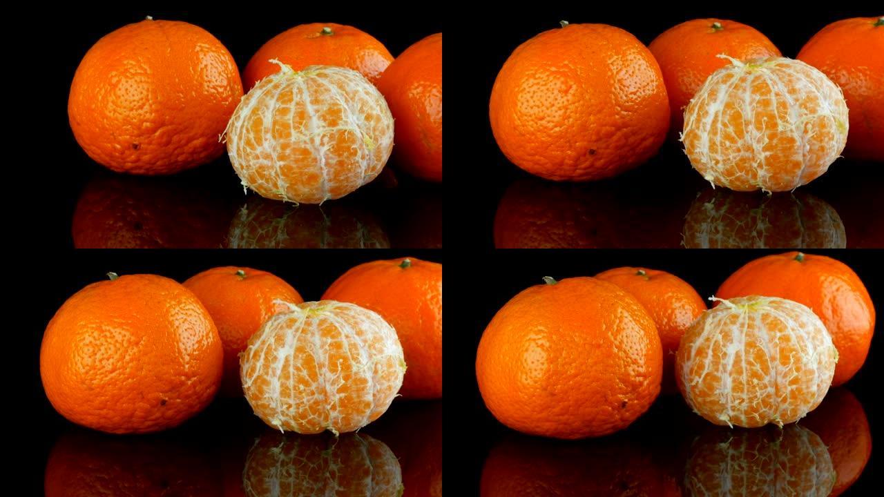 镜面上成熟的橙色橘子