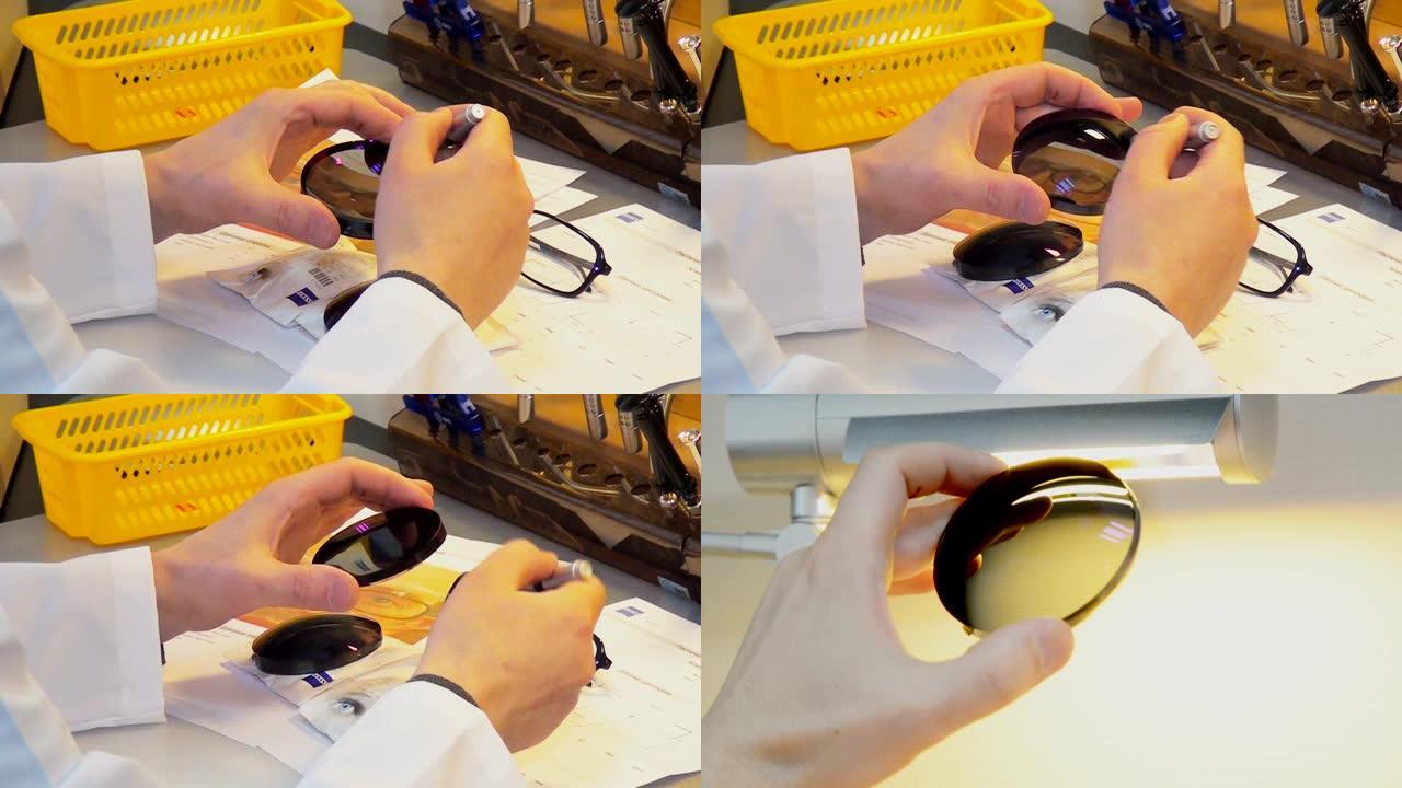 在实验室里准备光学镜片，眼睛镜片。