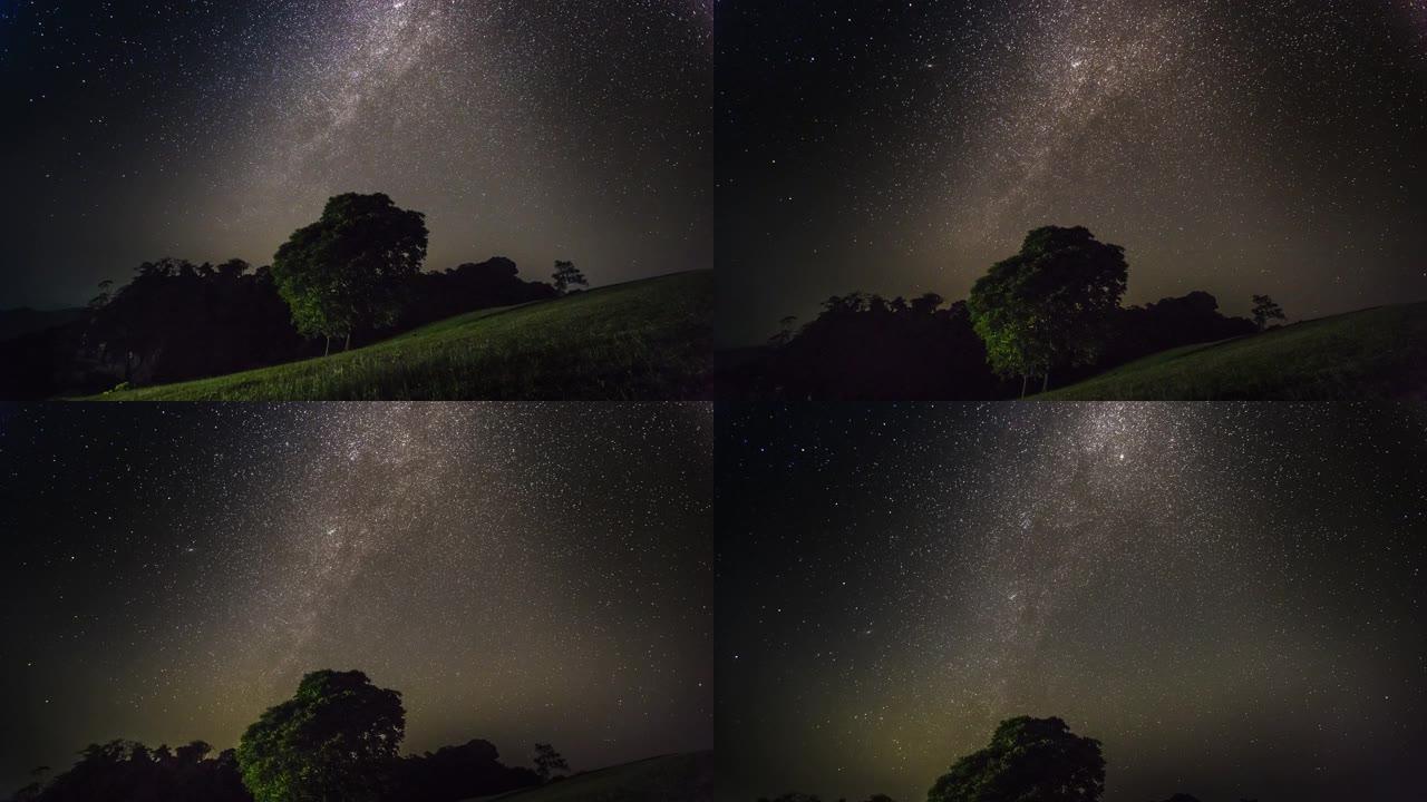 夜间多云天空上的银河系和星星的时间圈数