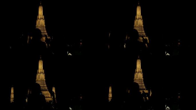 游客坐在roop top餐厅放松身心，背景式视图为昭披耶河上的Wat Arun。