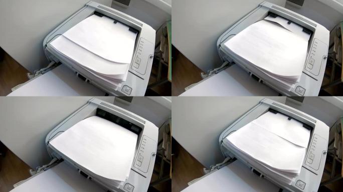 激光印刷机在办公室打印文件