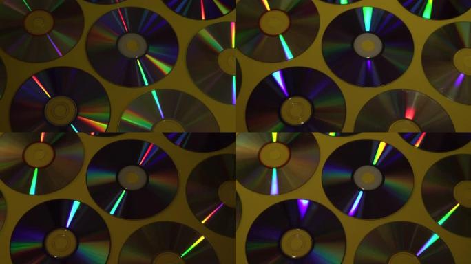 老式光盘或DVD光盘背景，用于数据存储的旧圆形光盘，共享电影和音乐