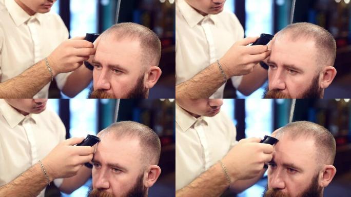理发男理发师。前台大胡子男人客户的头像。修剪器完成修饰
