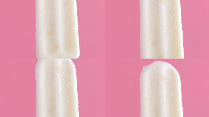 粉红色背景的椰奶和玉米冰淇淋。
