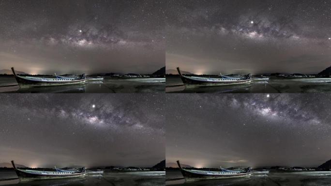 夜间多云天空上的银河系和星星的时间圈数