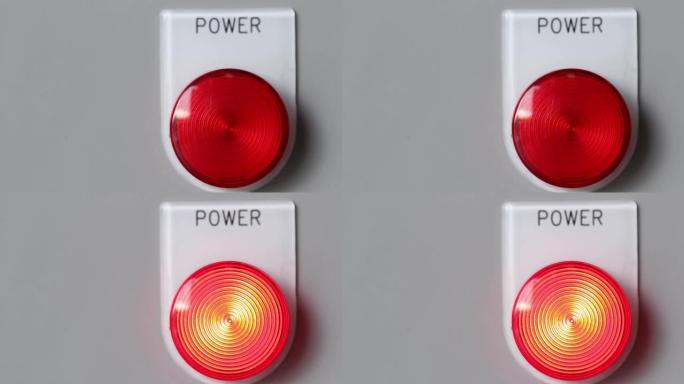 红色电源按钮和灯亮以启动机器