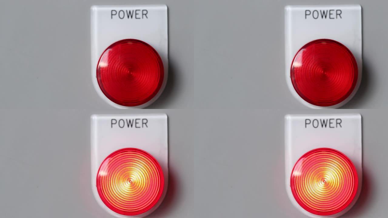 红色电源按钮和灯亮以启动机器