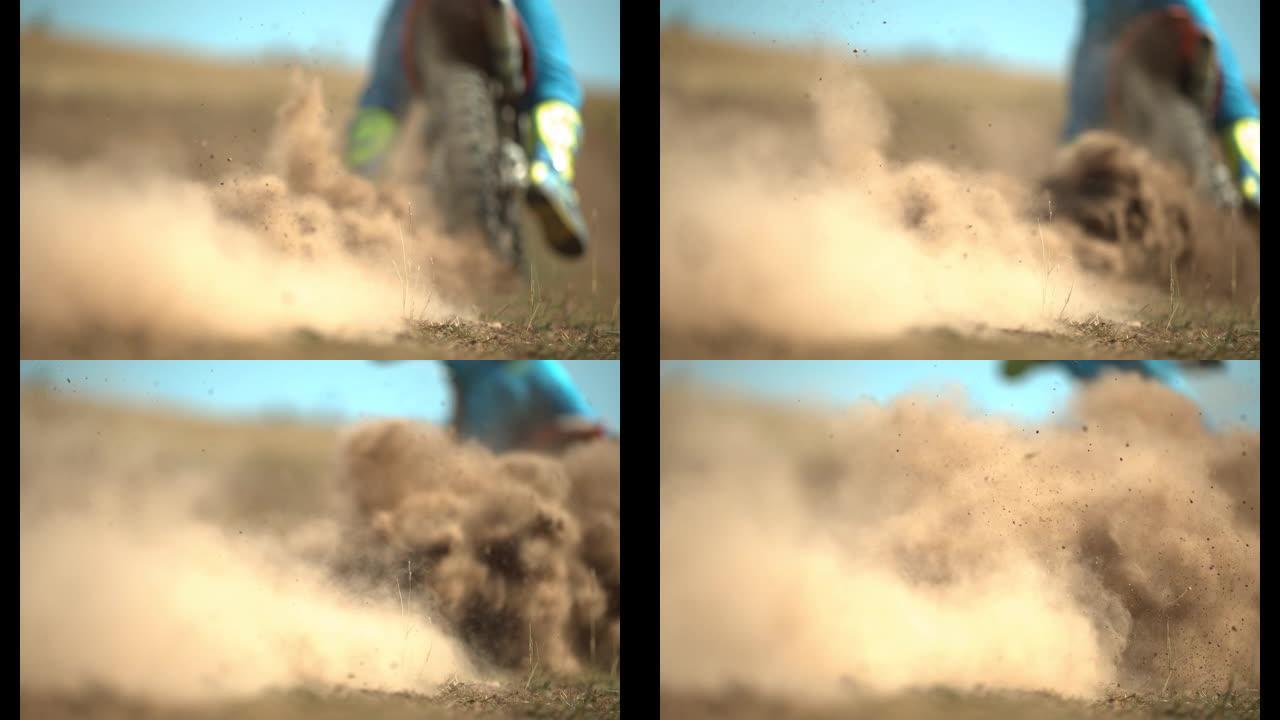 摩托车后面的灰尘山地摩托启动机车漫天灰尘