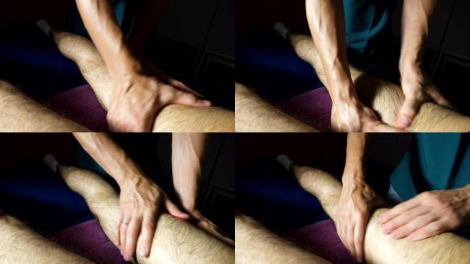 俯视图按摩师的男性手在沙龙做治疗年轻运动员的脚。专业按摩师的手臂按摩躺在客厅按摩台上的运动员的腿。慢