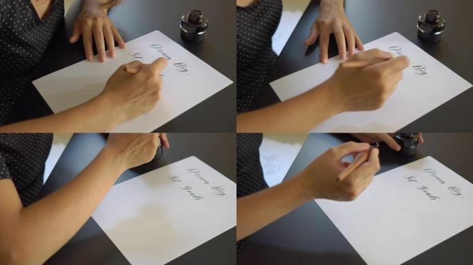 一个年轻女子使用刻字技术在纸上写字的特写镜头。她写了梦想的大设定目标采取行动