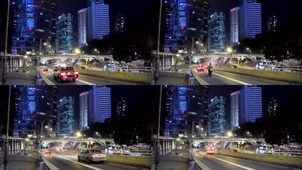 背景为香港中环夜空的街道交通