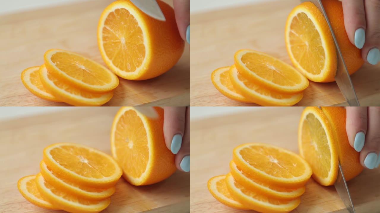 切柠檬和橙子。在水果中准备夏季鸡尾酒。