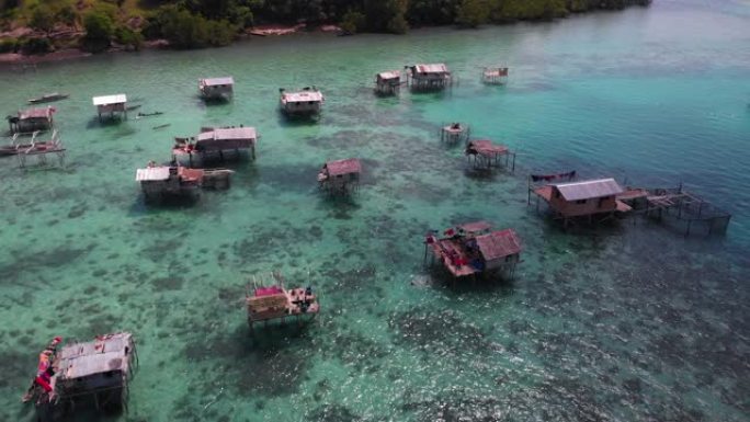 苏拉威西岛高跷房屋和船只的无人机拍摄的4k视频片段