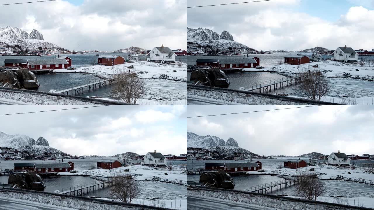冬季在罗弗滕群岛的海岸线上风雨如磐的渔村