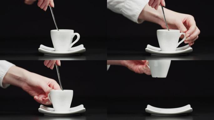 用手搅拌一杯咖啡