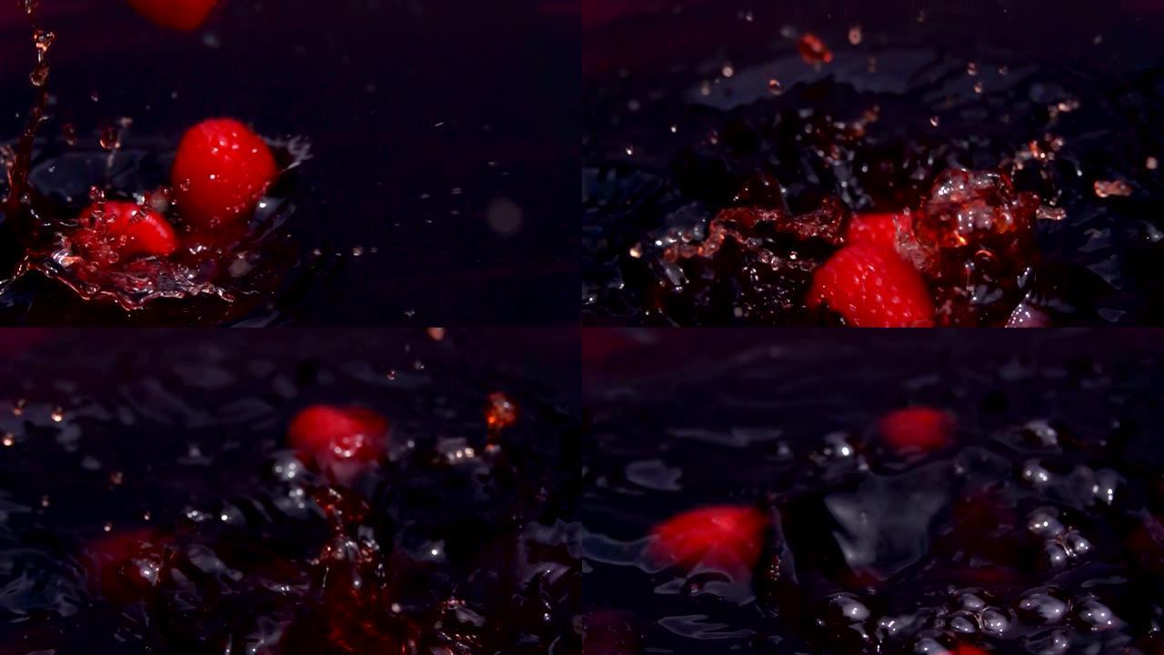 成熟的红树莓掉入果汁中