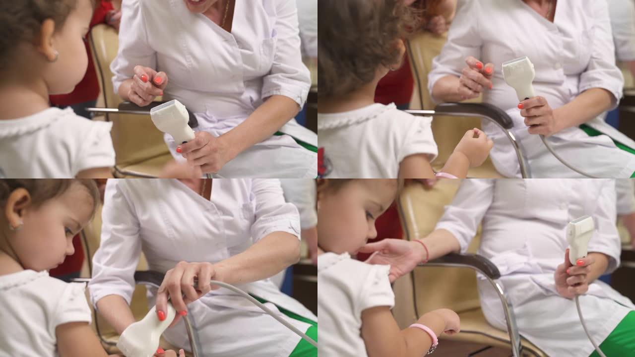 一位经验丰富的儿科医生的特写镜头向她的小病人解释了超声波检查的过程。医学概念