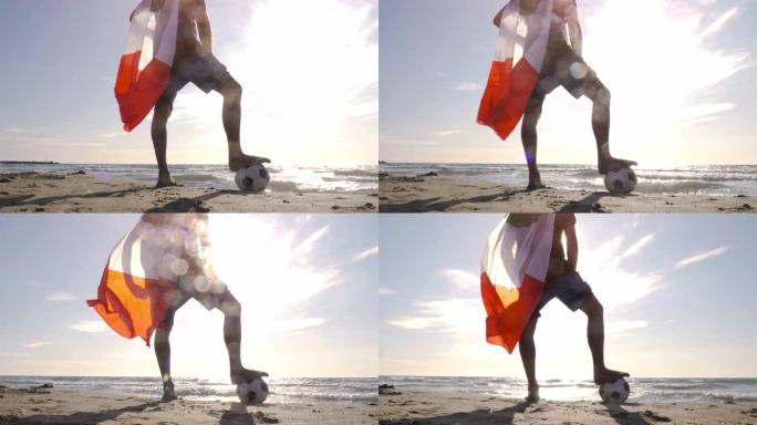 戴着意大利国旗的年轻人在海边的沙滩上站着足球，看着日落时海滩上的海洋摄像机steadycam万向节旋