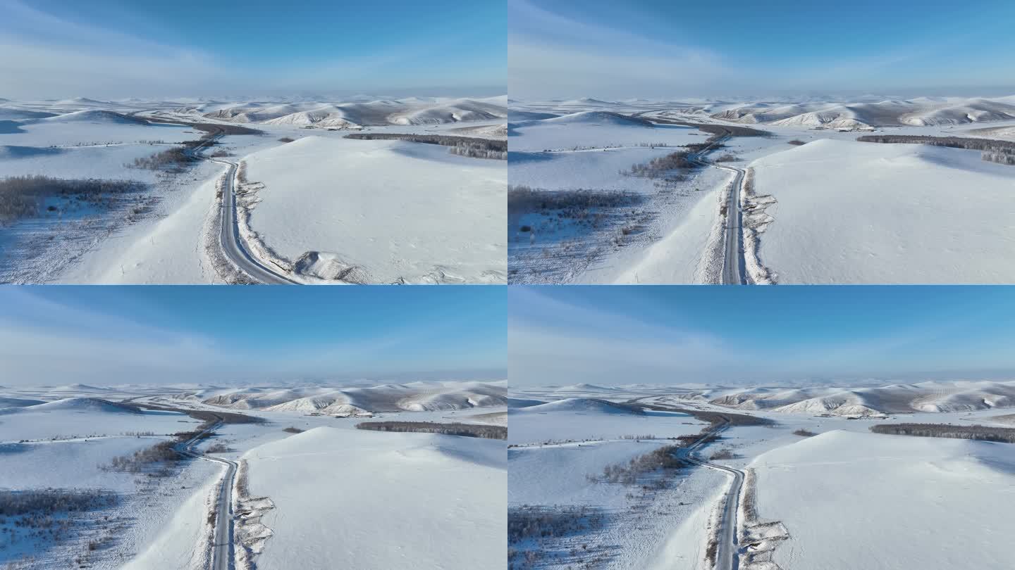 冬季丘陵雪景山间道路