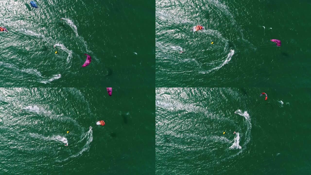 在海岸线上风筝冲浪赛船会的鸟瞰图，绿松石水，比赛，水上运动，事件，赛车，极限运动，冒险，旅游目的地，