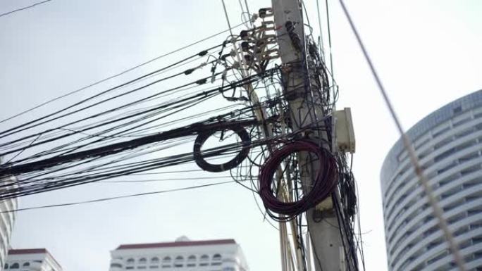 Messy wires attached to the electric pole, the cha