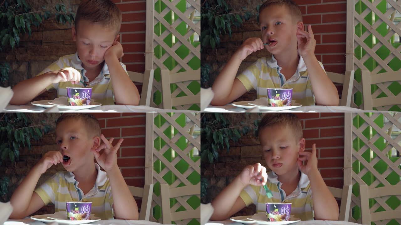 在夏季咖啡馆吃巧克力冰淇淋甜点的孩子