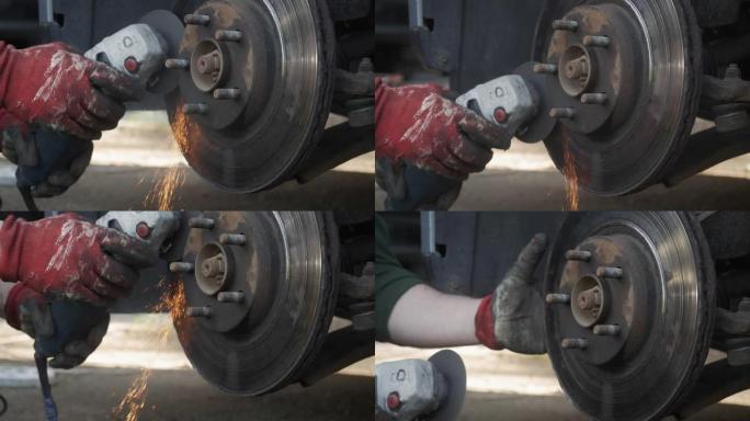 机械师用研磨机切割汽车的车轮