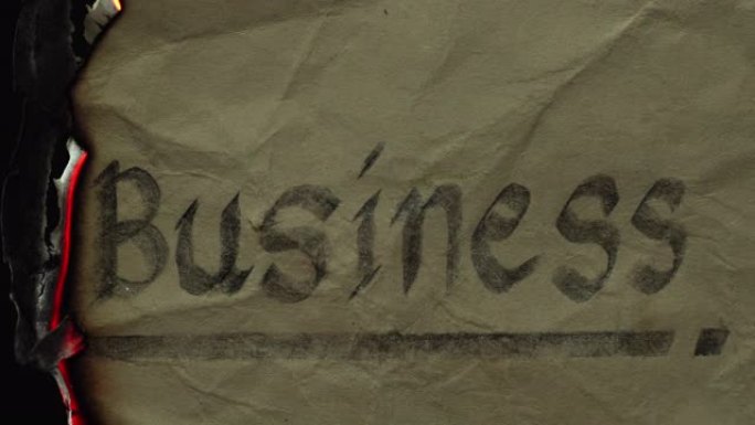 在旧纸上烧掉 “业务” 一词的文字。