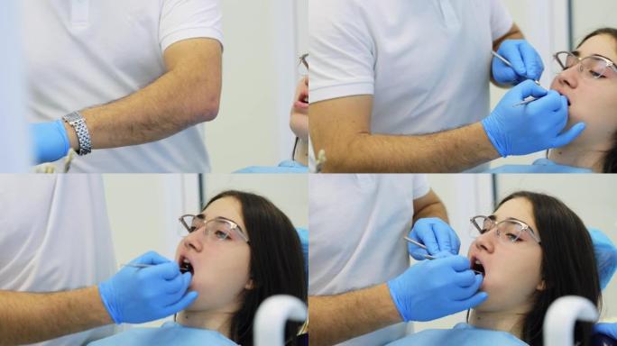 牙医为年轻女性患者制作牙齿填充物。