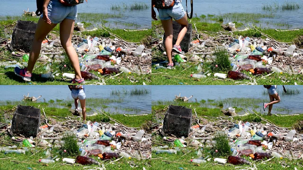 女人的腿在河边跳过垃圾