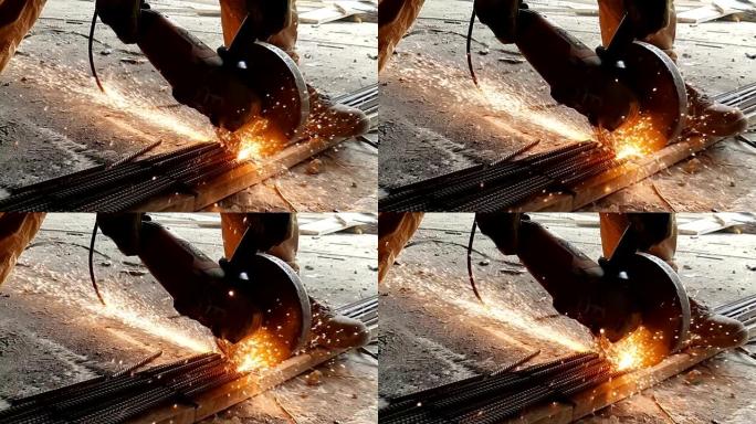 保加利亚人的特写镜头以慢动作切割金属。火花以960fps的慢动作从研磨机的轮子下面飞出