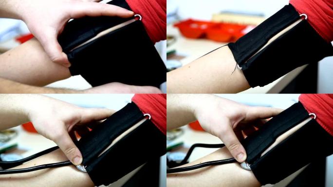 在女性手上放置血压测量装置的带子