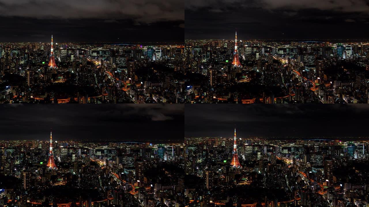 4k延时放大从日本东京六本木山夜间在摩天大楼城市景观商业金融大楼和东京塔上移动云层的宽镜头高角度鸟瞰