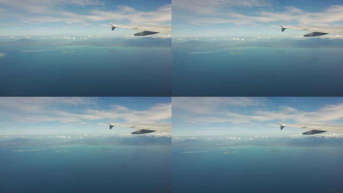 从海洋上的飞机窗口观看