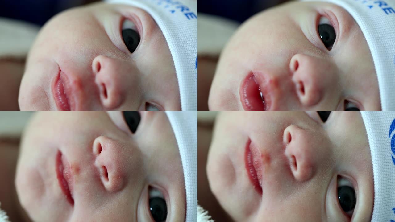 新生婴儿面部特写镜头在生命的最初几分钟内眼睛鼻子和嘴巴的细节