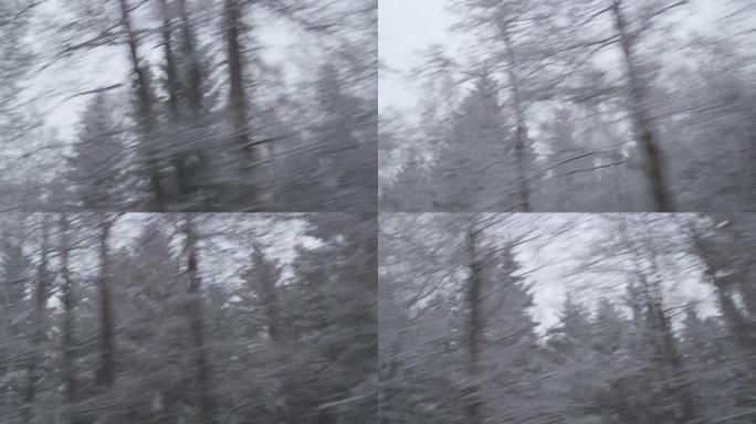 恶劣天气冬季驾驶-在一个大雾天在山路上驾驶-从侧窗看-手持相机