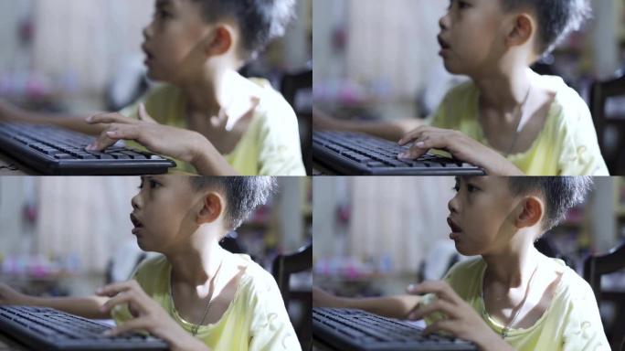 亚洲男孩打算使用计算机