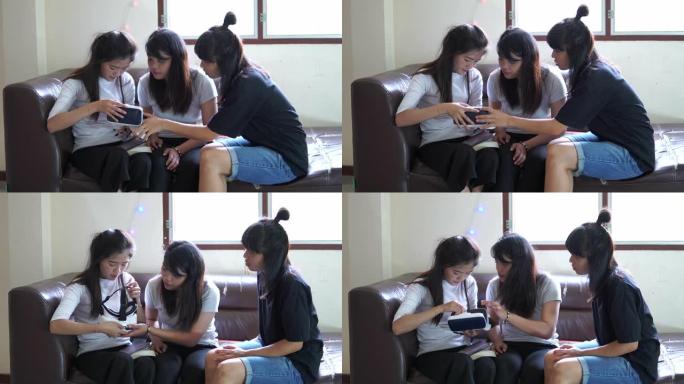 三位亚洲女性喜欢通过立体眼镜观看三维图像