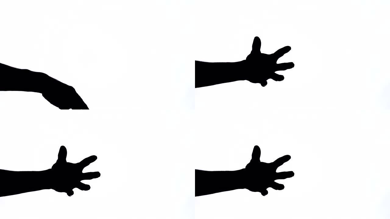 男性手做提问手势的特写。肢体语言。黑白镜头