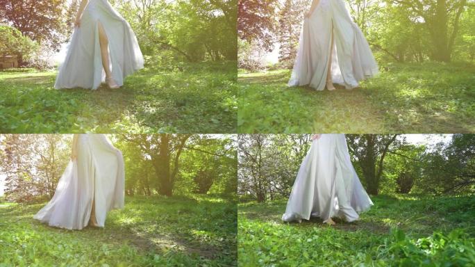 穿着长裙的女人慢动作走在绿草丛中