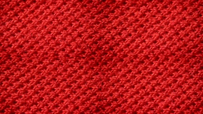 涤纶红色棉织物。编织长矛。微距拍摄。
