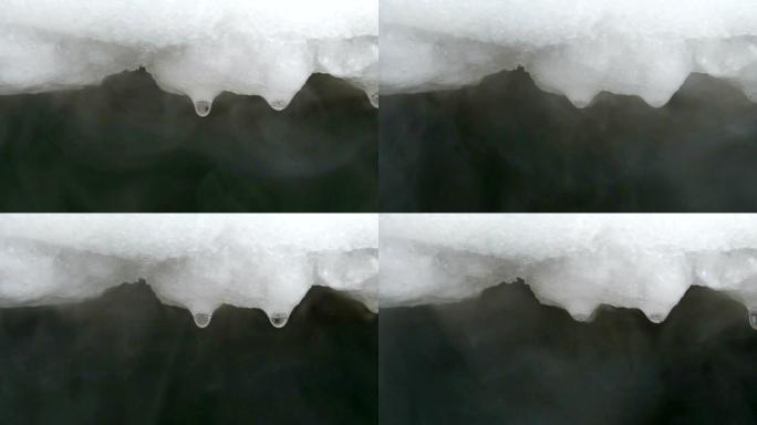 冰箱解冻期间，水滴从融化的冰中滴落