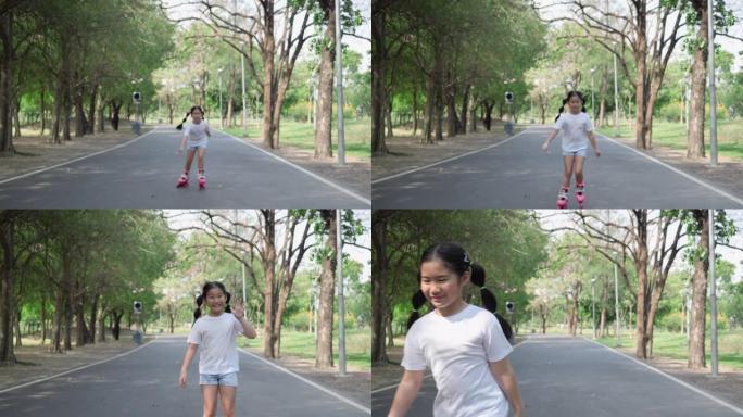 亚洲小女孩在公园的路上玩滑旱冰。活动假期的概念，学习发展和生活体验。4K分辨率和慢镜头。
