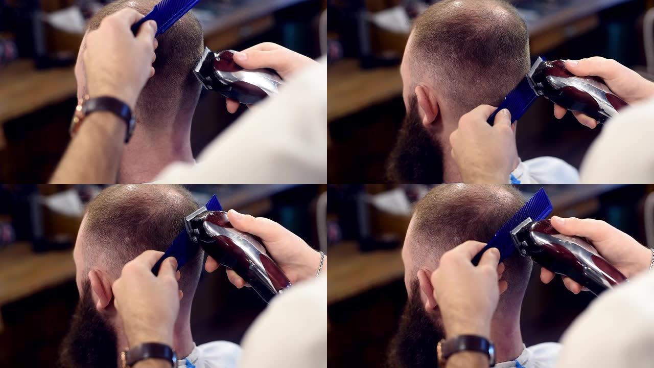男性客户头部后侧用电动理发推子和梳子剪发的理发特写
