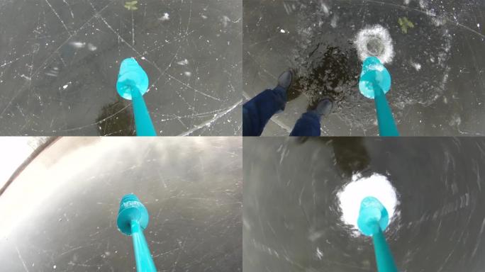 钓鱼冰在薄冰上钻孔