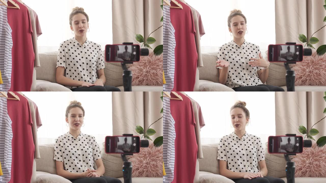 青少年时尚视频记录器在手机前谈论新衣服