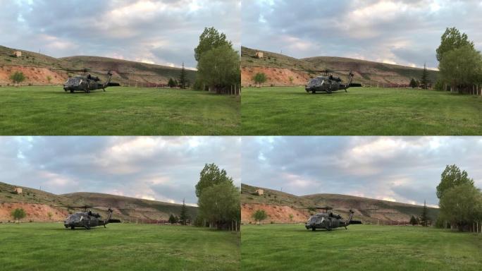 军用救援直升机(西科斯基)在乡间准备起飞