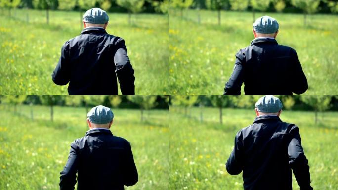 从后面以慢动作观察在自然环境中慢跑的老人的跟踪镜头