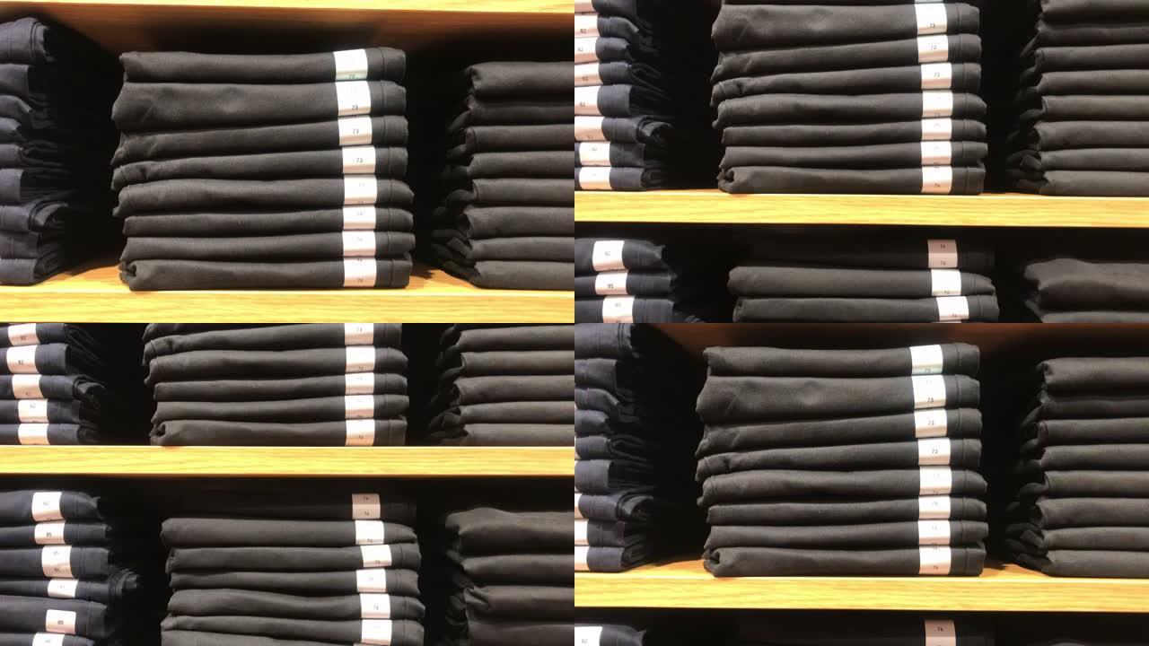 商店架子上的一堆裤子