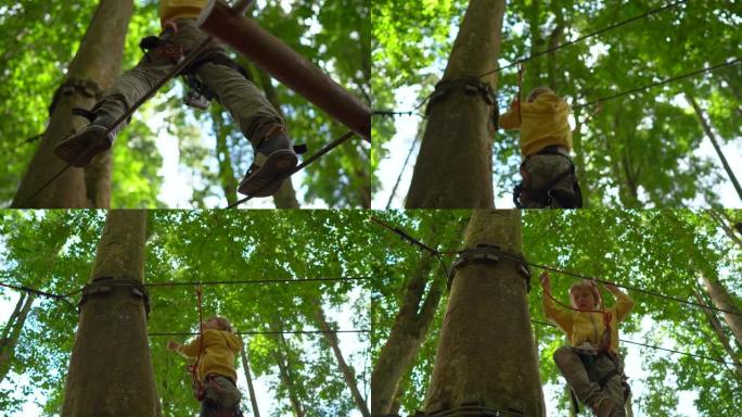 穿着安全带的小男孩在森林冒险公园的一条路线上攀爬。他爬上高高的绳索小径。户外娱乐中心，为成人和儿童提